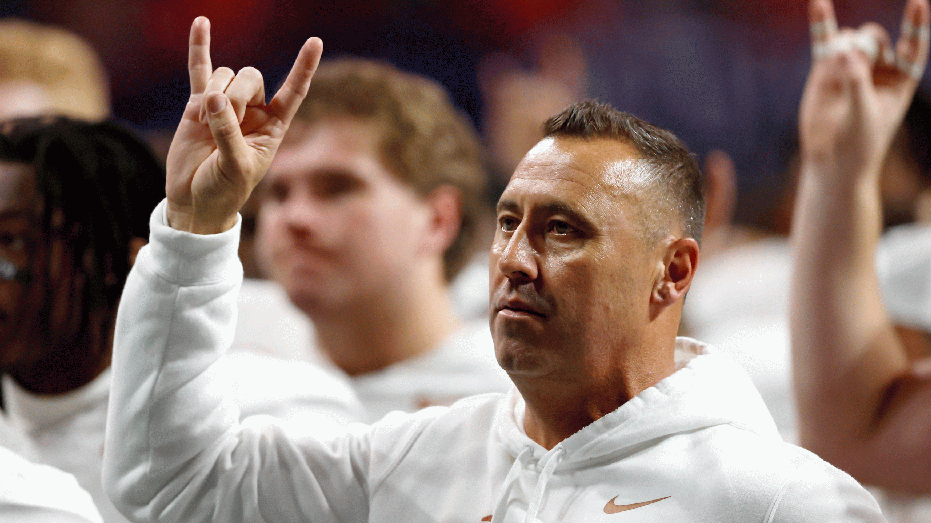 ATLANTA, GEORGIA - DECEMBER 07: Head coach Steve Sarkisian of the Texas Longhorns sings the fight song after the 22-19 overtime loss against the Georgia Bulldogs in the 2024 SEC Championship at Mercedes-Benz Stadium on December 07, 2024 in Atlanta, Georgia. (Photo by Butch Dill/Getty Images)