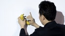 Justin Sun, founder of Tron, prepares to eat a banana that forms part of the artwork &quot;Comedian&quot; by the artist&nbsp;Maurizio&nbsp;Cattelan, which Sun bought for $6.2 million at Sotheby&apos;s in New York, during a news conference in Hong Kong, China, on Friday, Nov. 29, 2024. Controversial crypto mogul Sun beamed as he ate the $6.2 million banana, a spectacle that ratcheted up the spotlight on digital assets as the industry tries to keep an historic market rally on track. Photographer: Justin Chin/Bloomberg via Getty Images