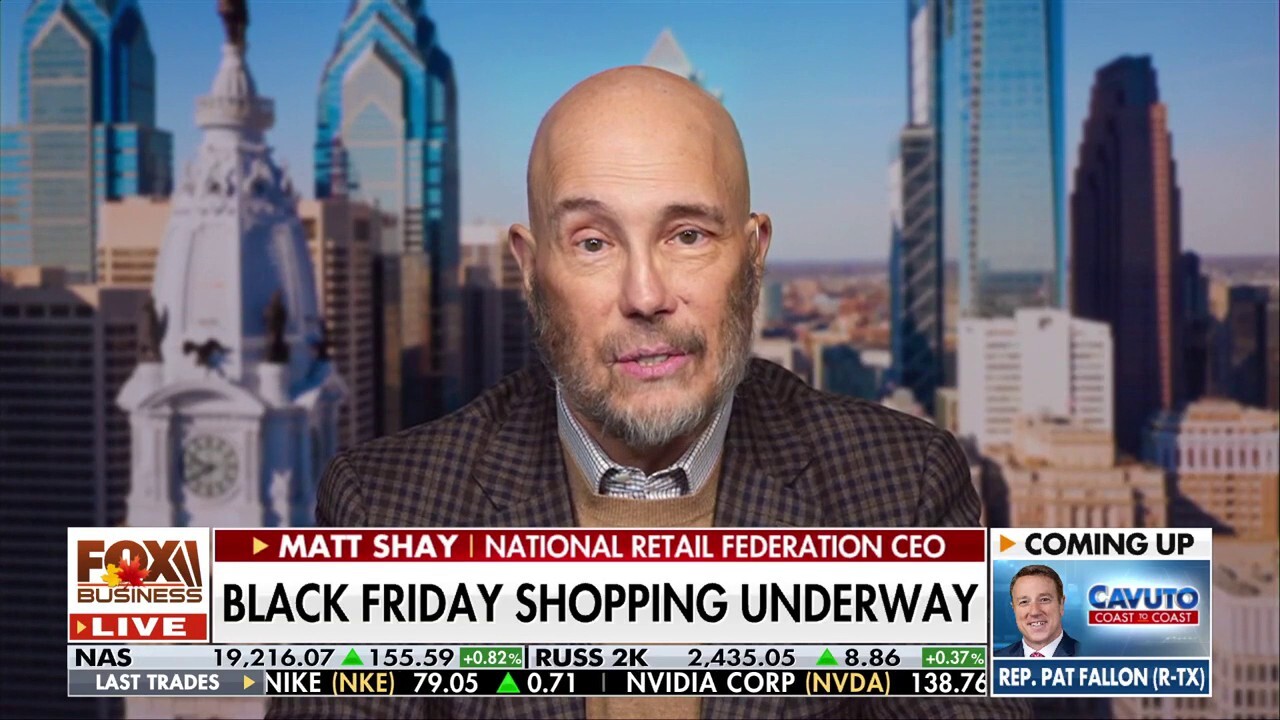 National Retail Federation CEO Matt Shay reacts to the latest report that holiday spending is expected to reach $989B this year. 