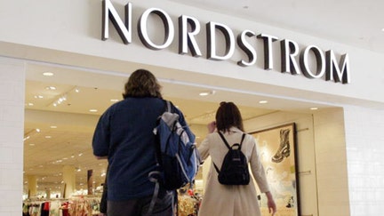 CHICAGO -  APRIL 01:  Shoppers enter the Nordstrom store April 1, 2003 on Michigan Avenue in Chicago. Nordstrom, Inc. announced yesterday that based on quarter-to-date sales, first quarter 2003 earnings per share are expected to be below expectations.  (Photo by Scott Olson/Getty Images)