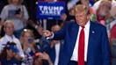 Former US President and Republican presidential candidate Donald Trump acknowledges the crowd during a campaign rally in Uniondale, New York, on September 18, 2024.